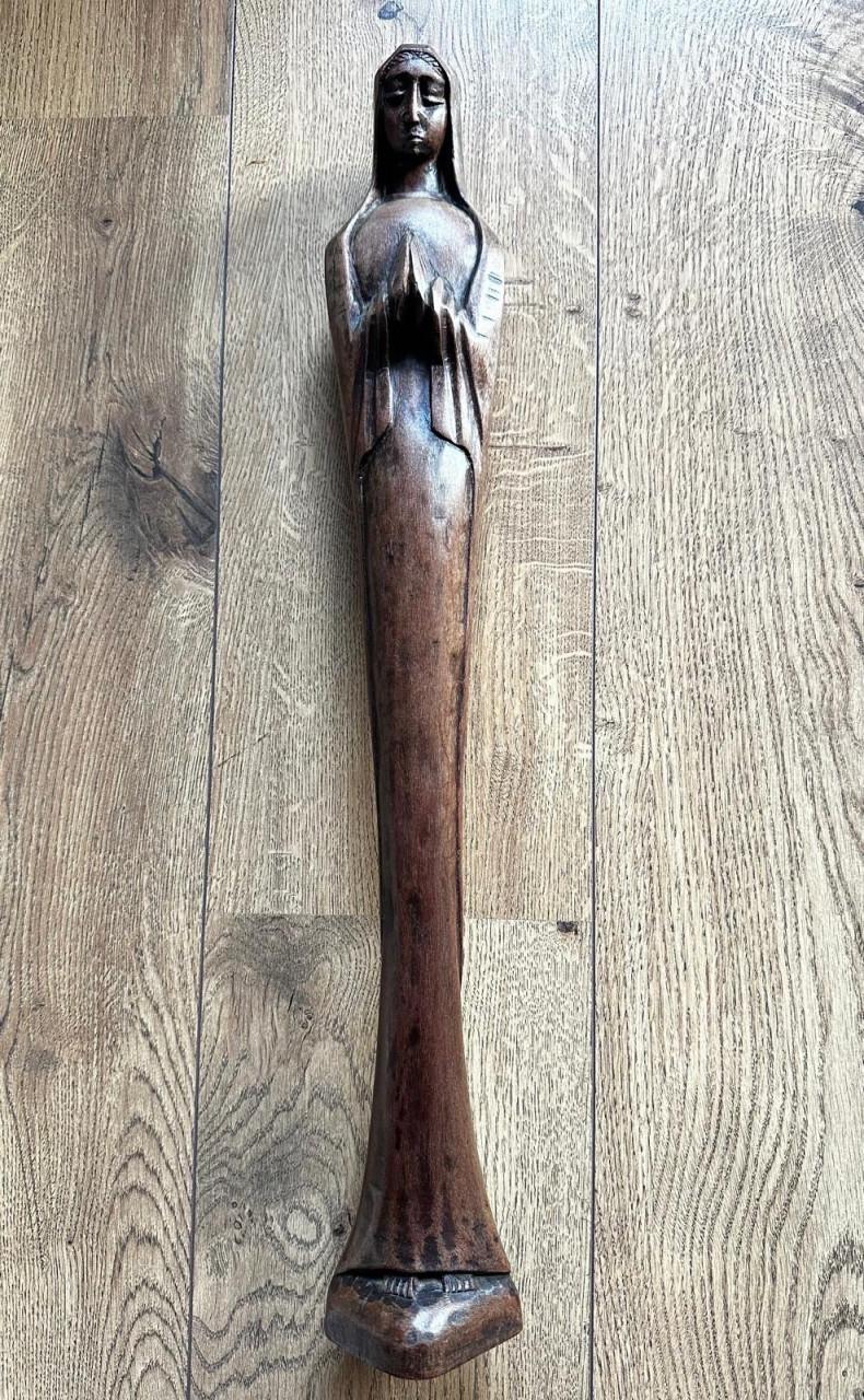 Hout gestoken beelden. Afrikaans en Maria beeld