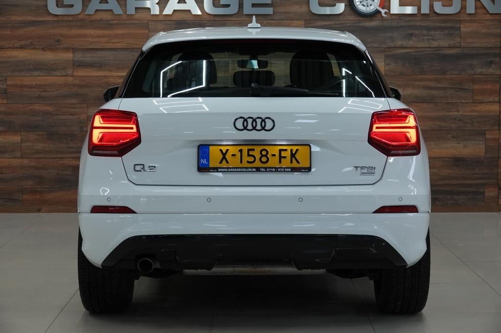 Audi Q2 1.0 tfsi sport | stoelverw. | led | pdc | 19" |