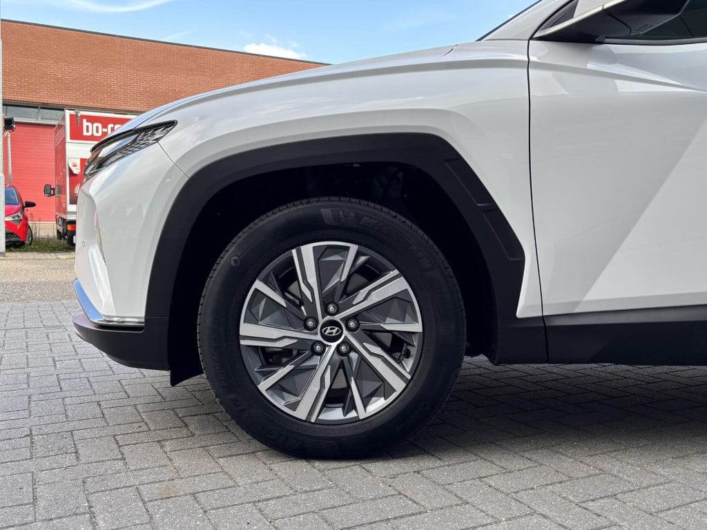Hyundai Tucson Hybrid 1.6 t-gdi hev comfort smart | navigatie | camera | ap