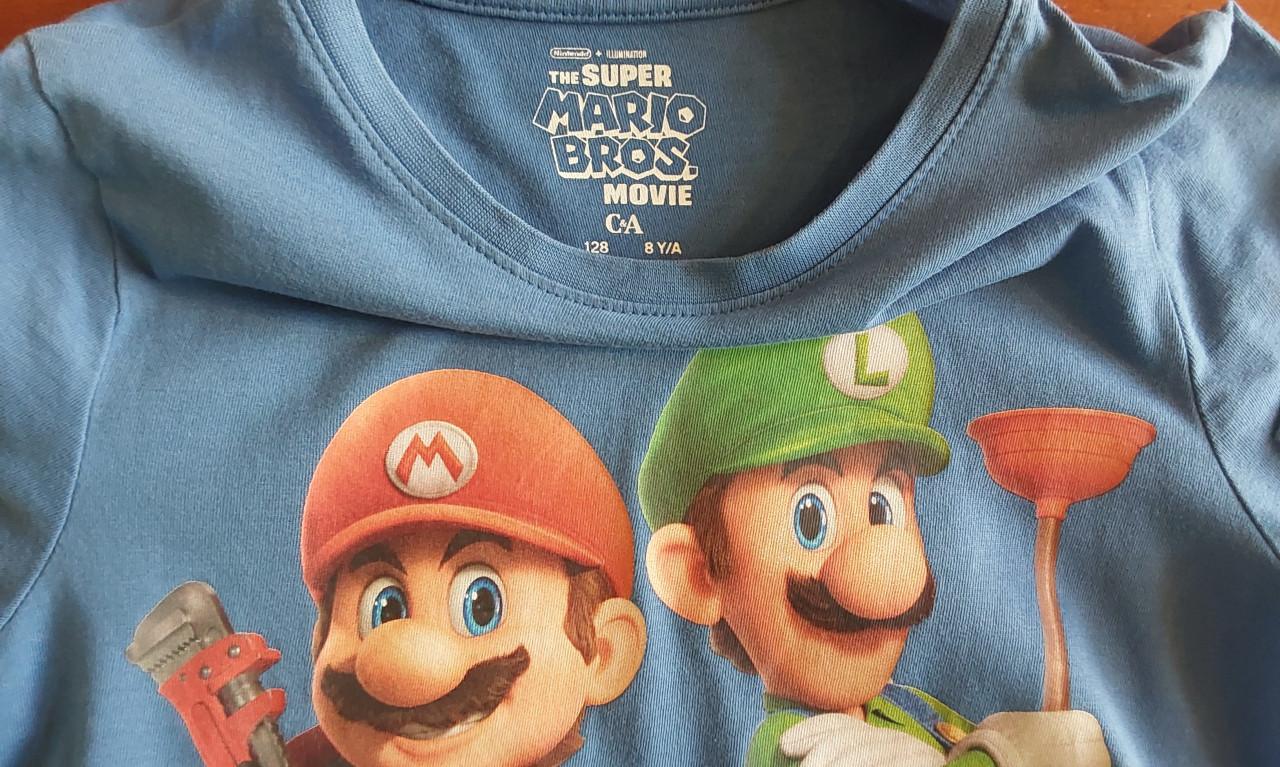 Lichtblauw t-shirt van Super Mario Bros Movie van het merk C&A in maat 128
