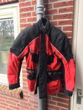 Motorjas met protectie reflectie en thermo voering maat 42 in goede staat