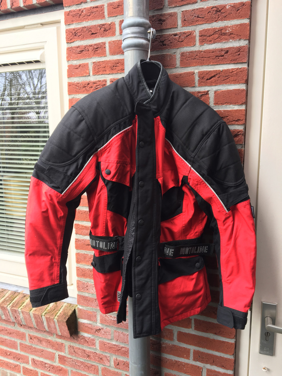 Motorjas met protectie reflectie en thermo voering maat 42 in goede staat