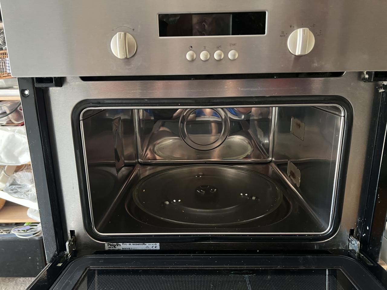 Inbouw Magnetron 60 cm. Breed als nieuw met gebruiksaanwijzing