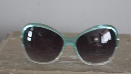 Transparante groene  zonne bril