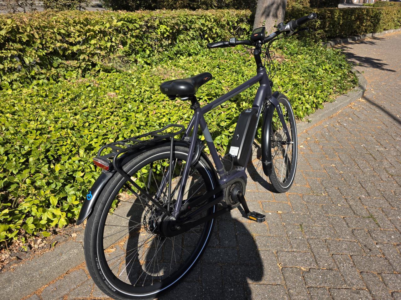 Keurig nette Brinckers elektrische heren fiets met middenmotor
