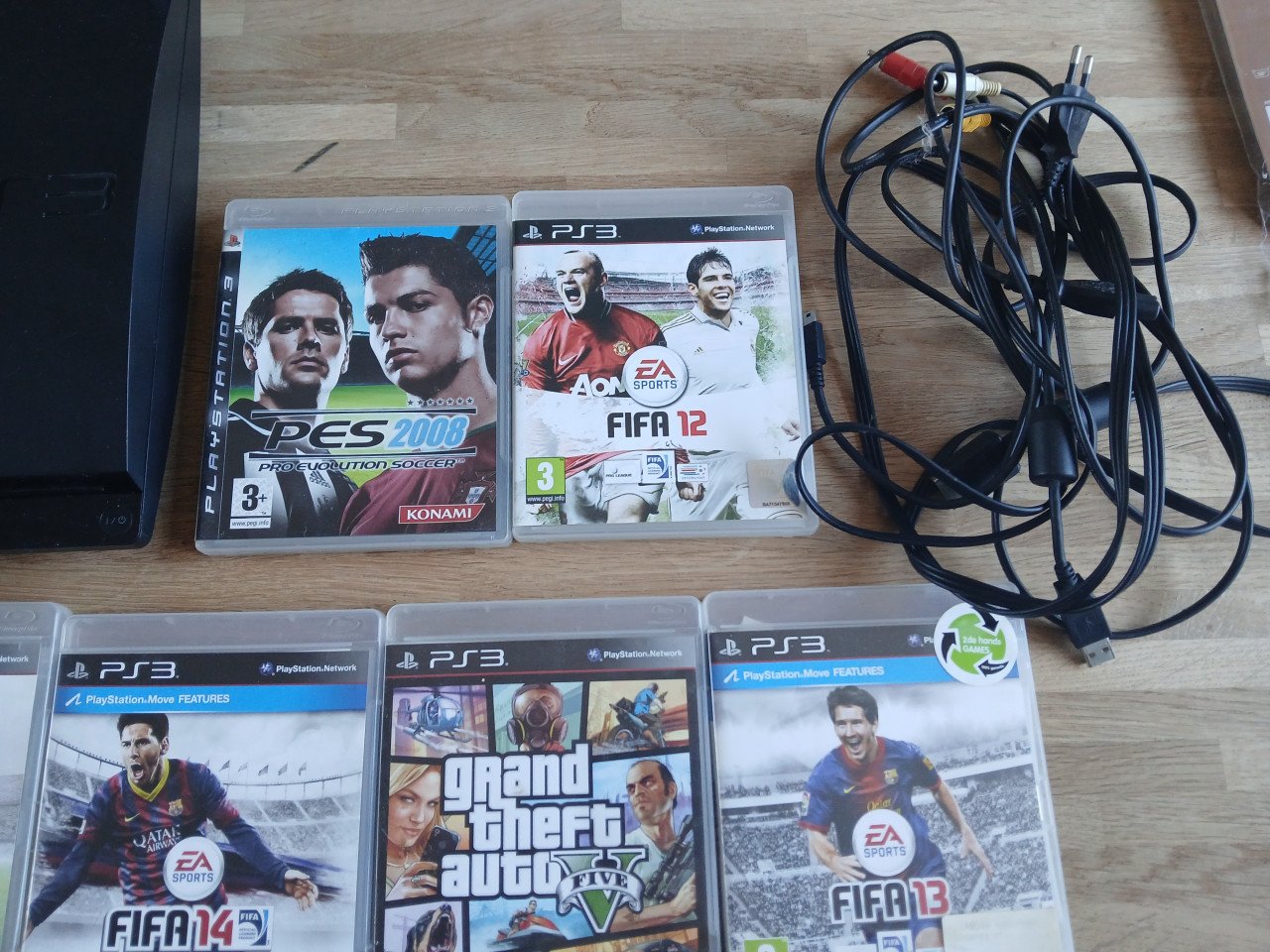Playstation 3 met 2 controllers en 8 games