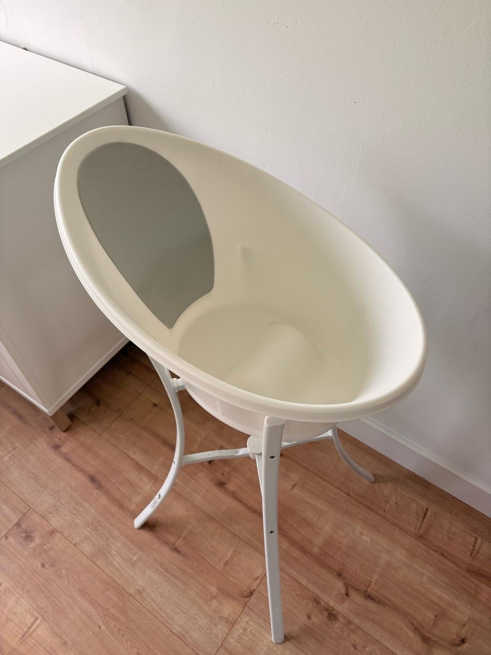 Zittend babybadje Shnuggle