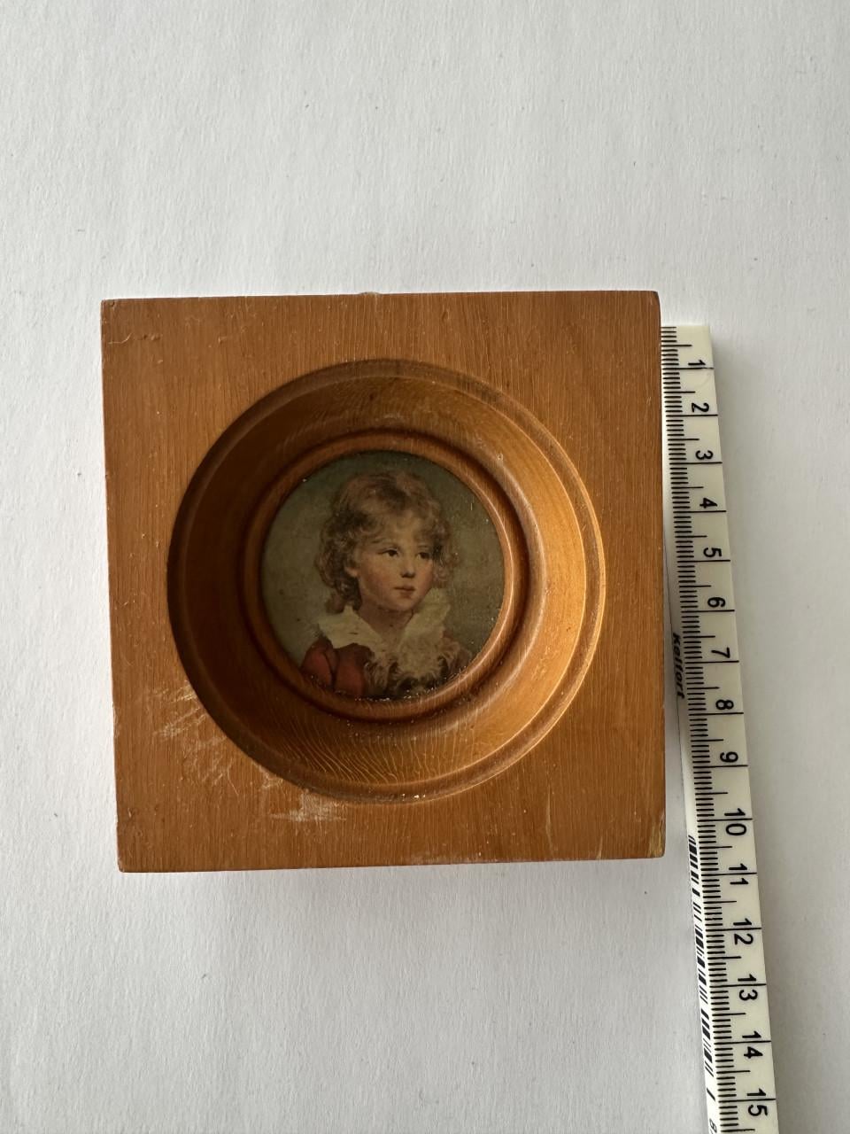 Klein houten schilderijtje