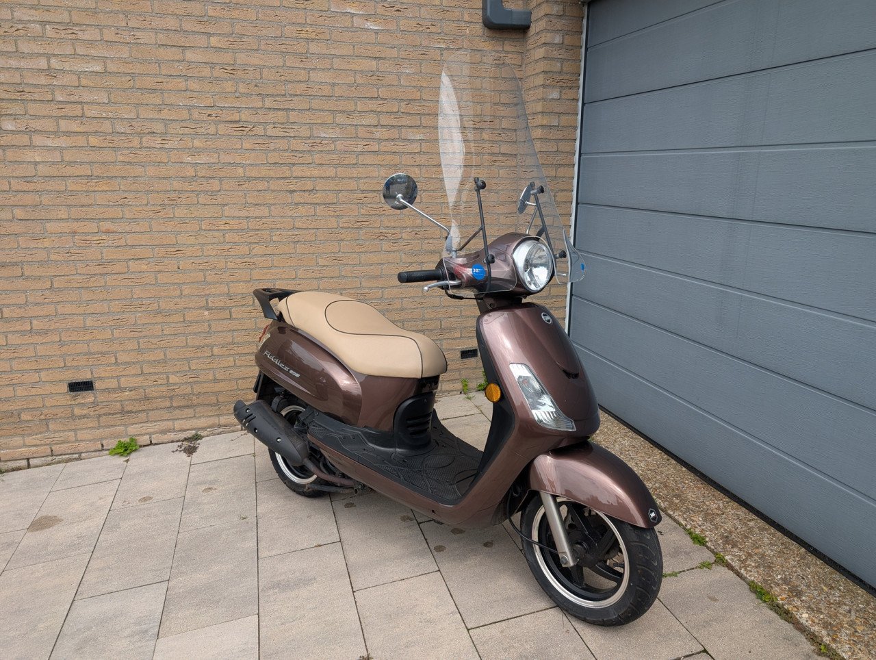 Zeer nette Sym Fiddle II scooter met slechts 4700 echte km op de teller