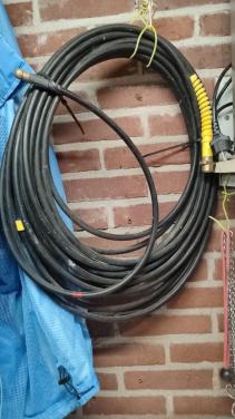 Reiniging slang riool plus dakgoot