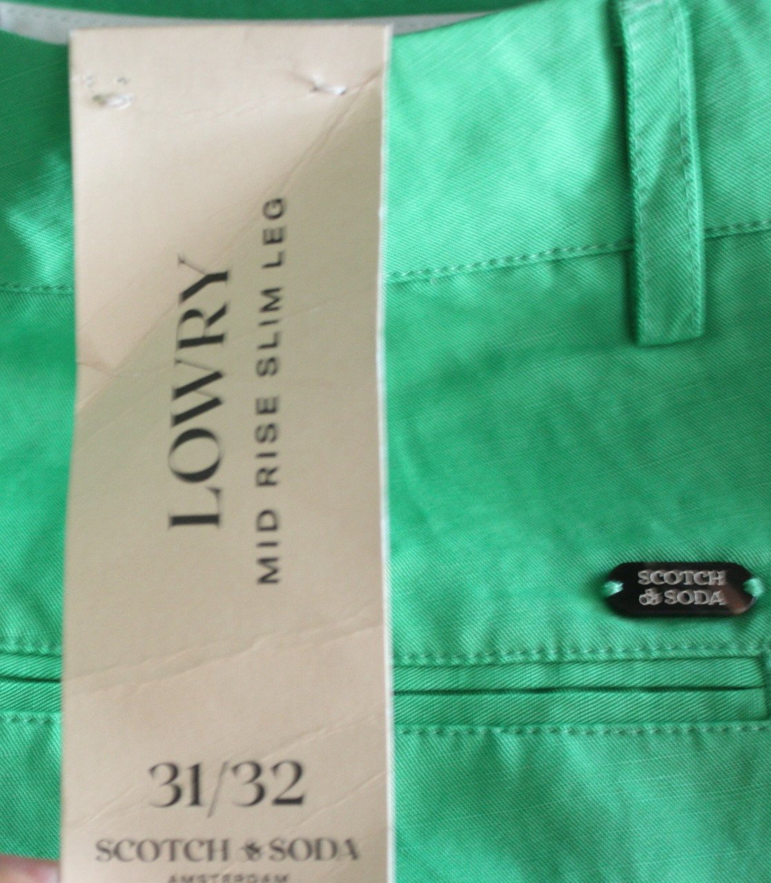 Nieuwe groene broek maat 27-32