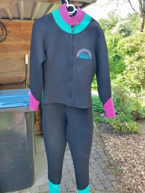 Te koop wetsuite (m54) + Surflaarsjes (m43/44)