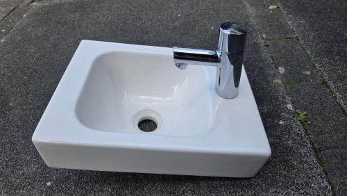 Sphinx fontein met Grohe kraan
