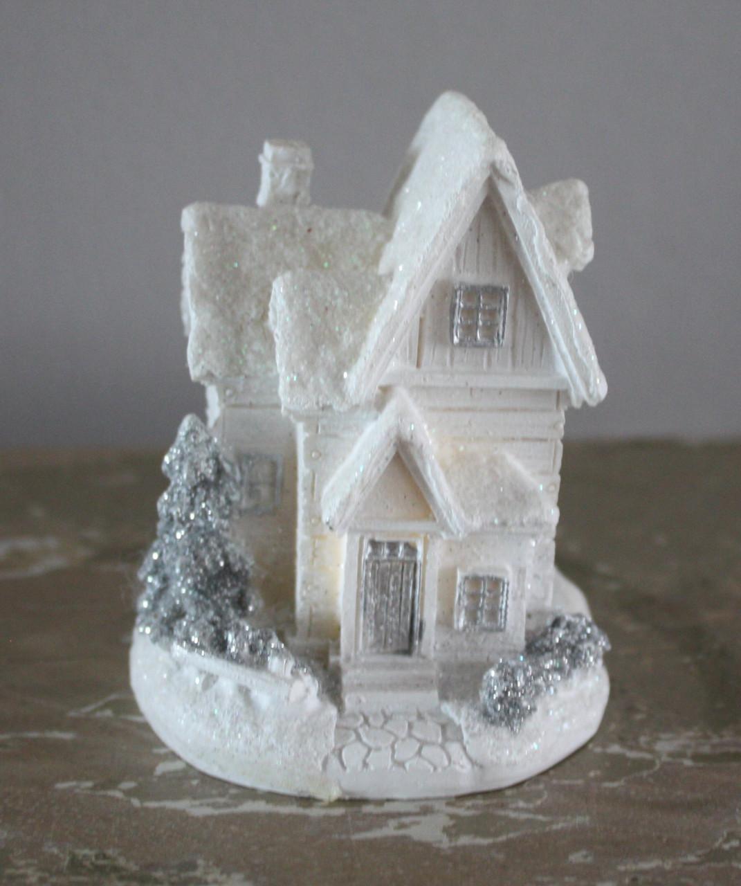 Wit kersthuisje et licht