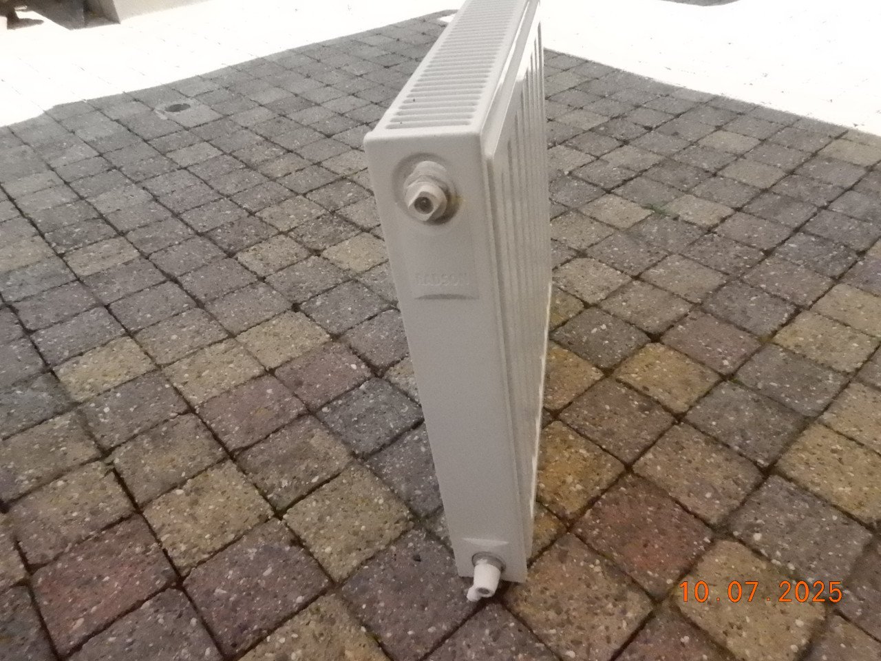 Kleine radiator voor in wc of badkamer