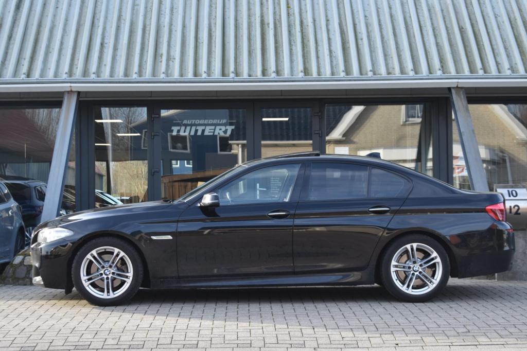BMW 5 Serie 520i m sport | schuifdak | camera | leder | nap | adapt. cruise