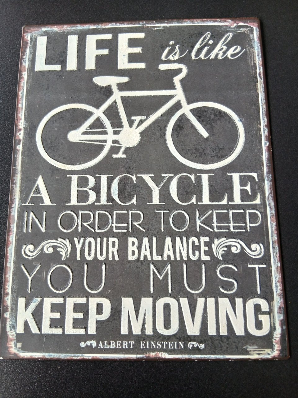 Metalen wandbord life is like a bicycle