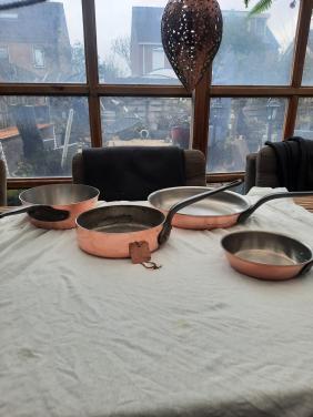 Te koop koperen pannen