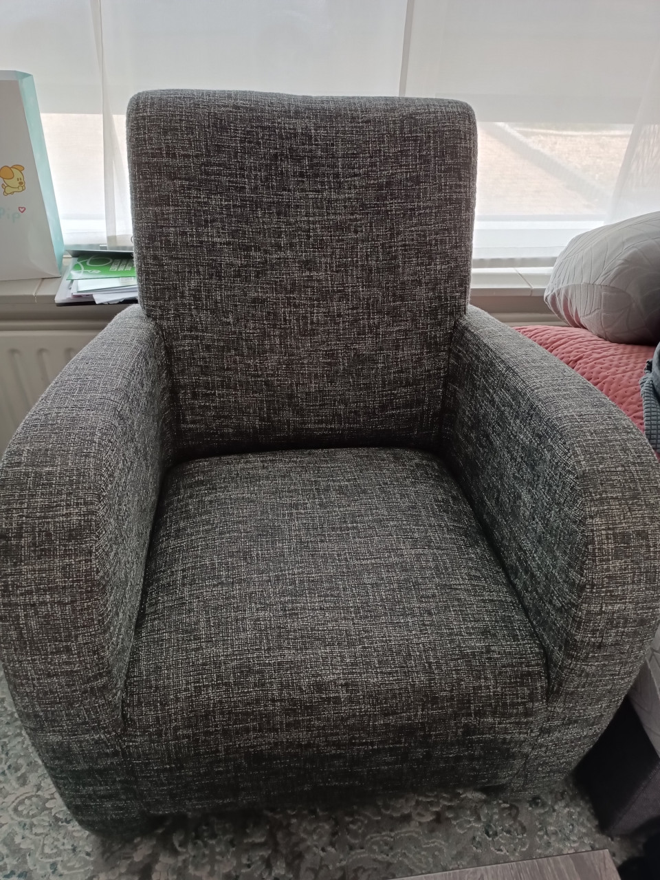 Grijze fauteuil met gratis hoes