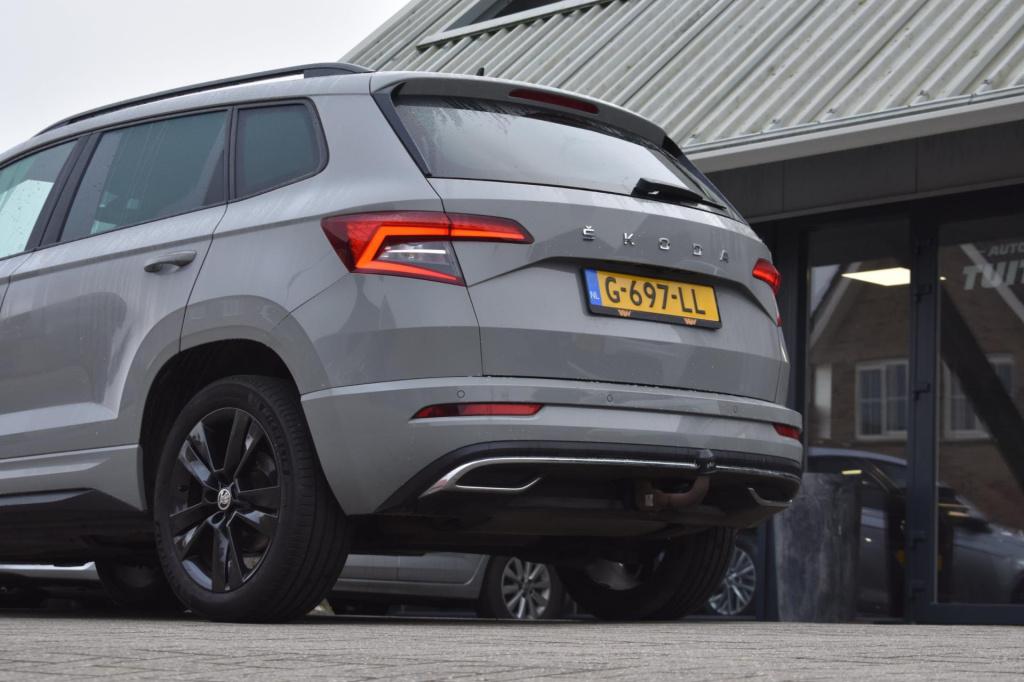 Skoda Karoq 1.5 tsi act sportline | trekhaak | camera | nap | canton | appl