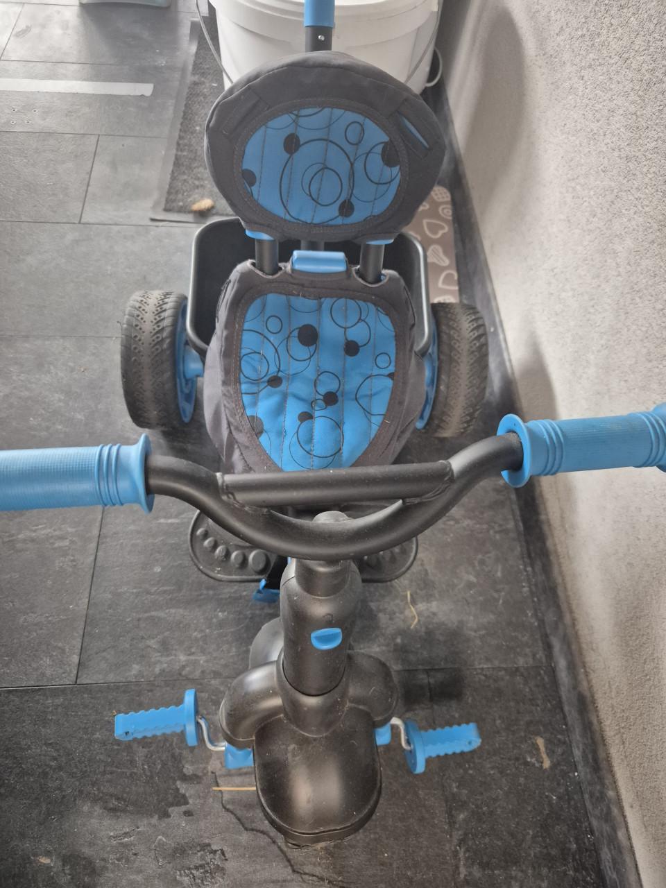 Driewieler met duwstang