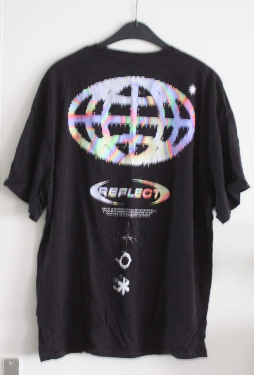 Zwart shirt met print aan d achterkant  nr 2 maat xl