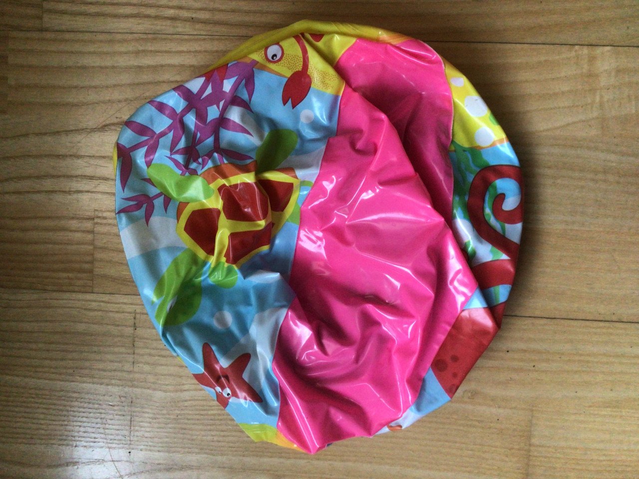 Kinderbadje met zwemband en bal