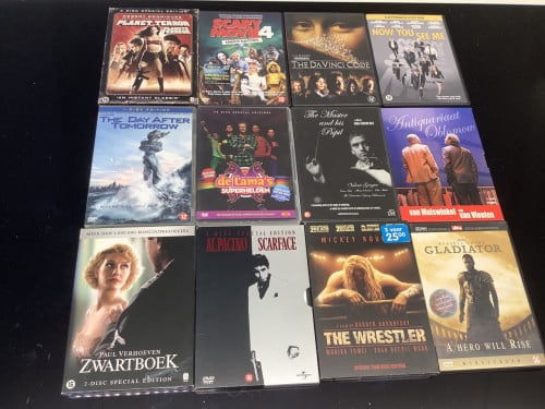 Stapeltje dvd’s met topfilms te koop aangeboden, zie de foto’s aub.