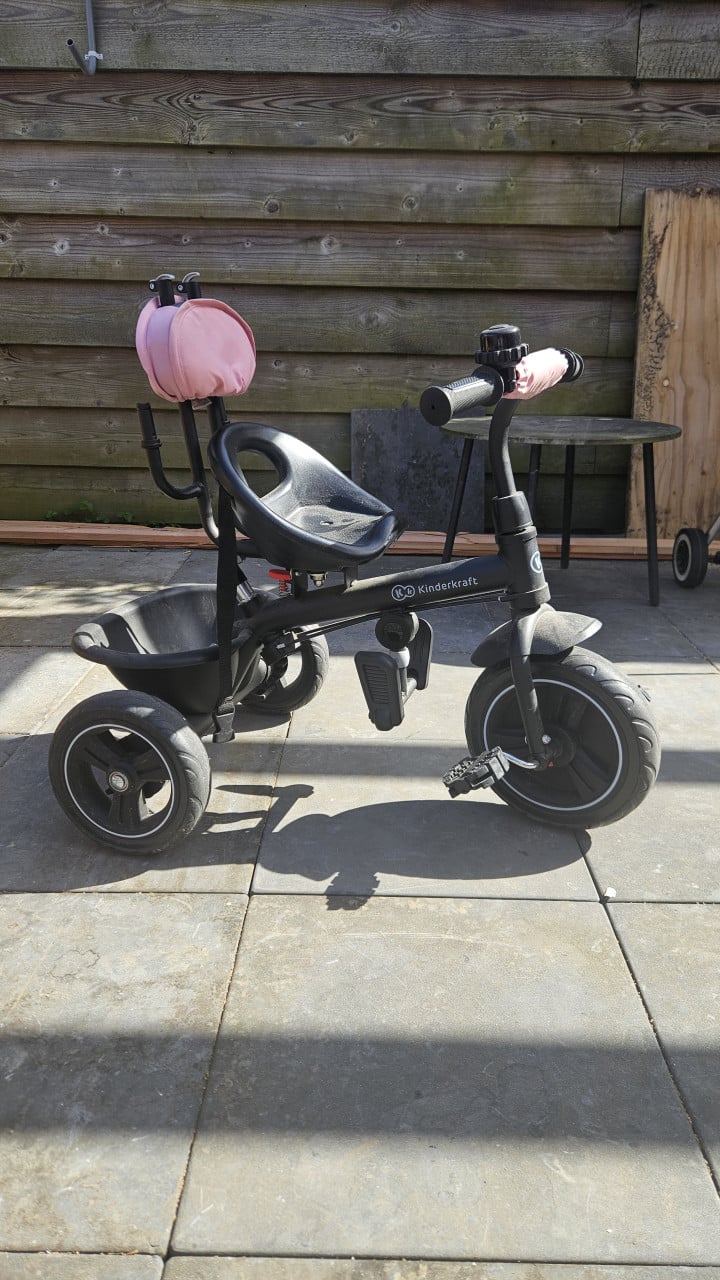 Roze meegroei kinder driewieler