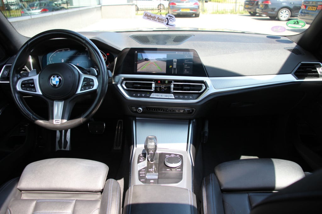 BMW 3-serie touring 320i high executive m pakket | pano | laser | leder