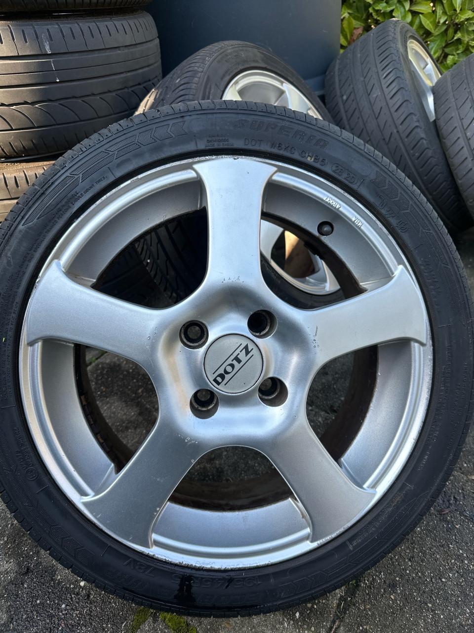 4x100 Dotz velgen met goede banden