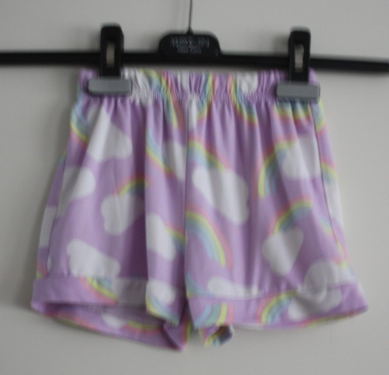 Paars broekje met bloemen print maat 110-116