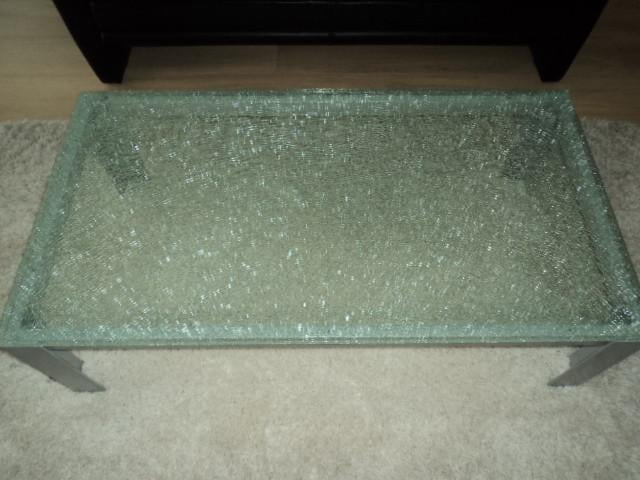 Te koop mooie crash glazen eettafel +salontafel met metalen poten grijs