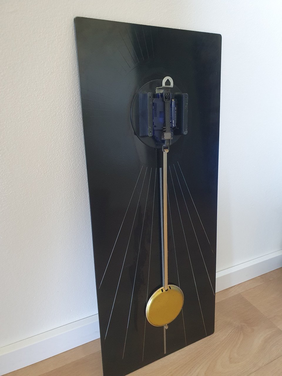 Moderne zwarte glazen klok 70x30 cm