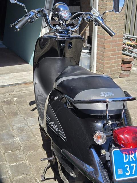 Sym Allo