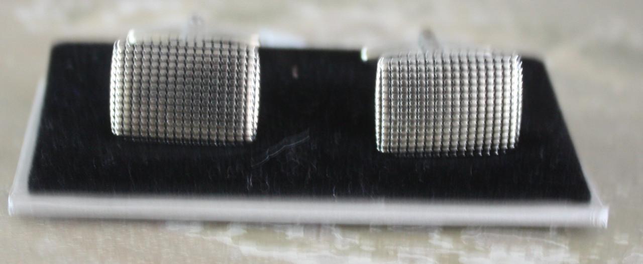 Nieuw manchetknopen met wafel patroon