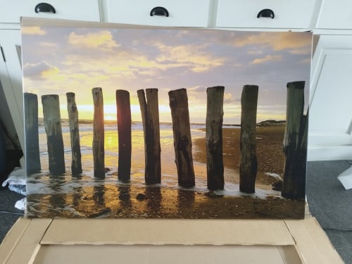 Foto paalhoofden op tuindoek