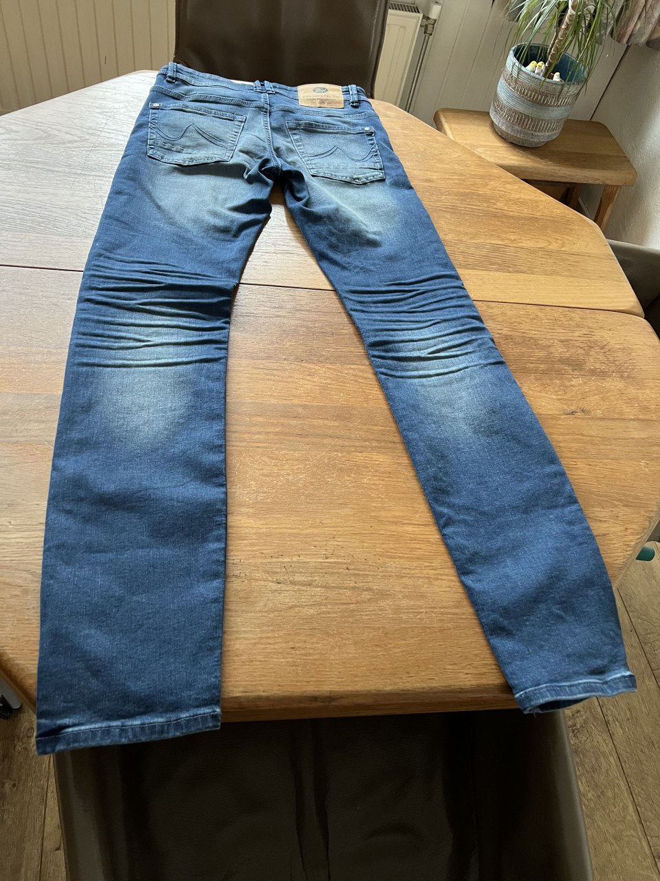 Te koop: petrol jeans