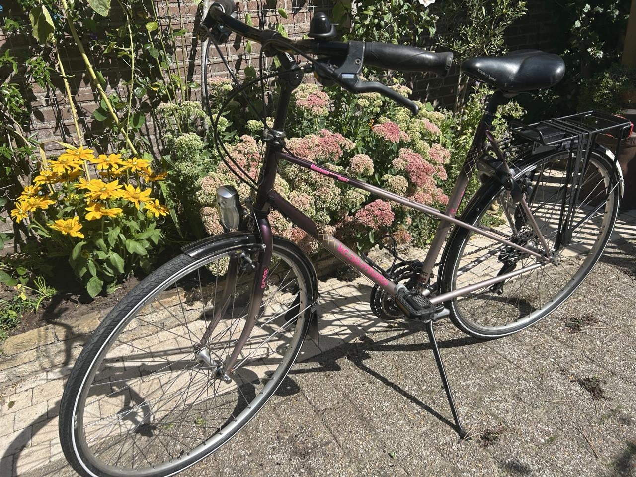 Dames fiets Koga Miyata 28 inch. 21 versn. velgrem verlichting. OK!