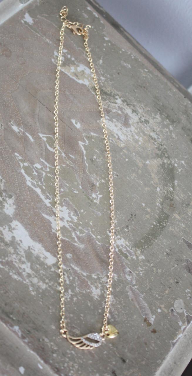 Goudkleurige ketting met steentjes