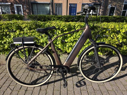 Qwic Premium elektrische heren fiets met Bafang M420 middenmotor