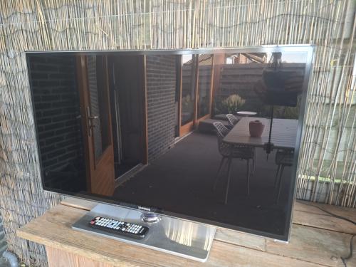 Samsung TV met 5.1 Blu-ray 3D-thuisbioscoopsysteem.