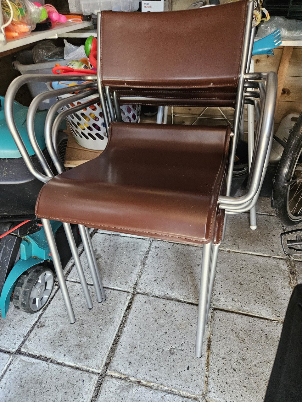 4 RVS en lederen eetkamerstoelen