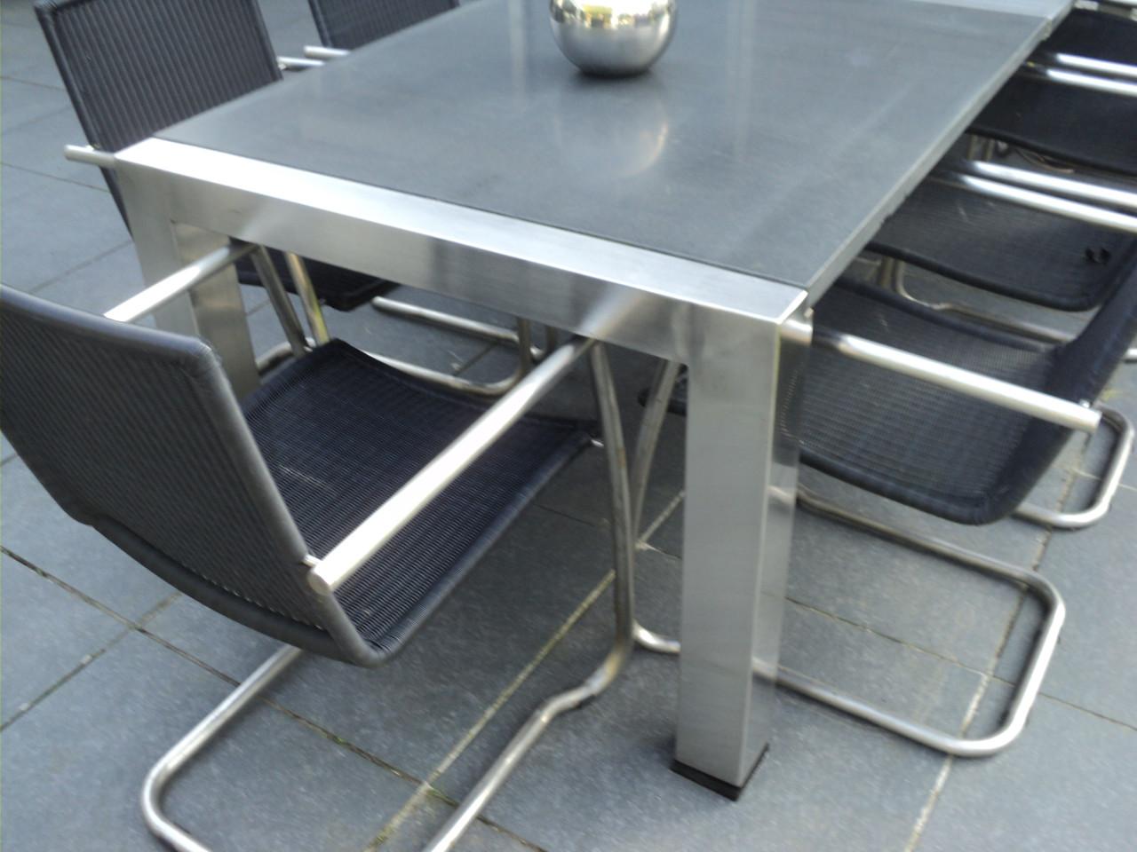 Prachtige RVS tafel met granietblad met wijn koeler 10 RVS stoelen