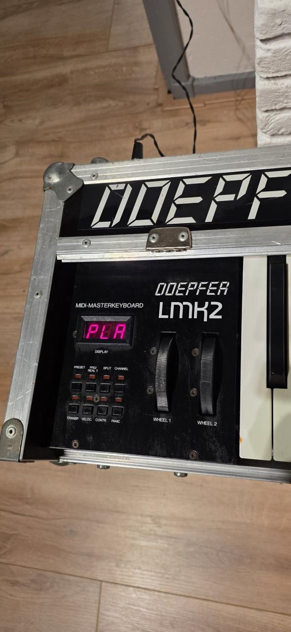 Roland JV 1010 synthesizer en Doepfer LMK2+ Piano