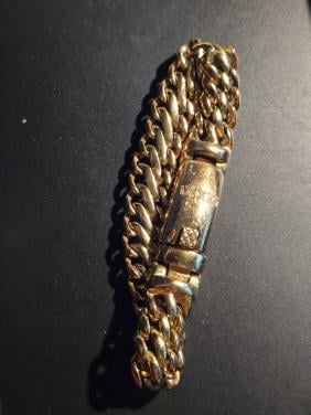 Goudkleurige Ixxxi schakel armband Edelstaal lengte 20 cm