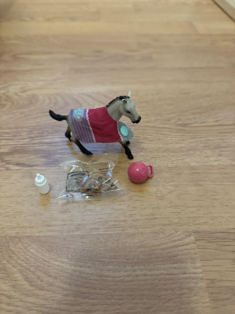 Schleich Quarter Horse-veulen met speelbal