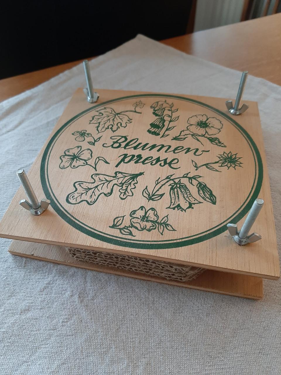 Mooie houten bloemenpers