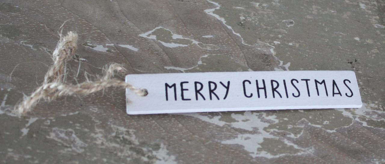 Witte houten hanger met tekst