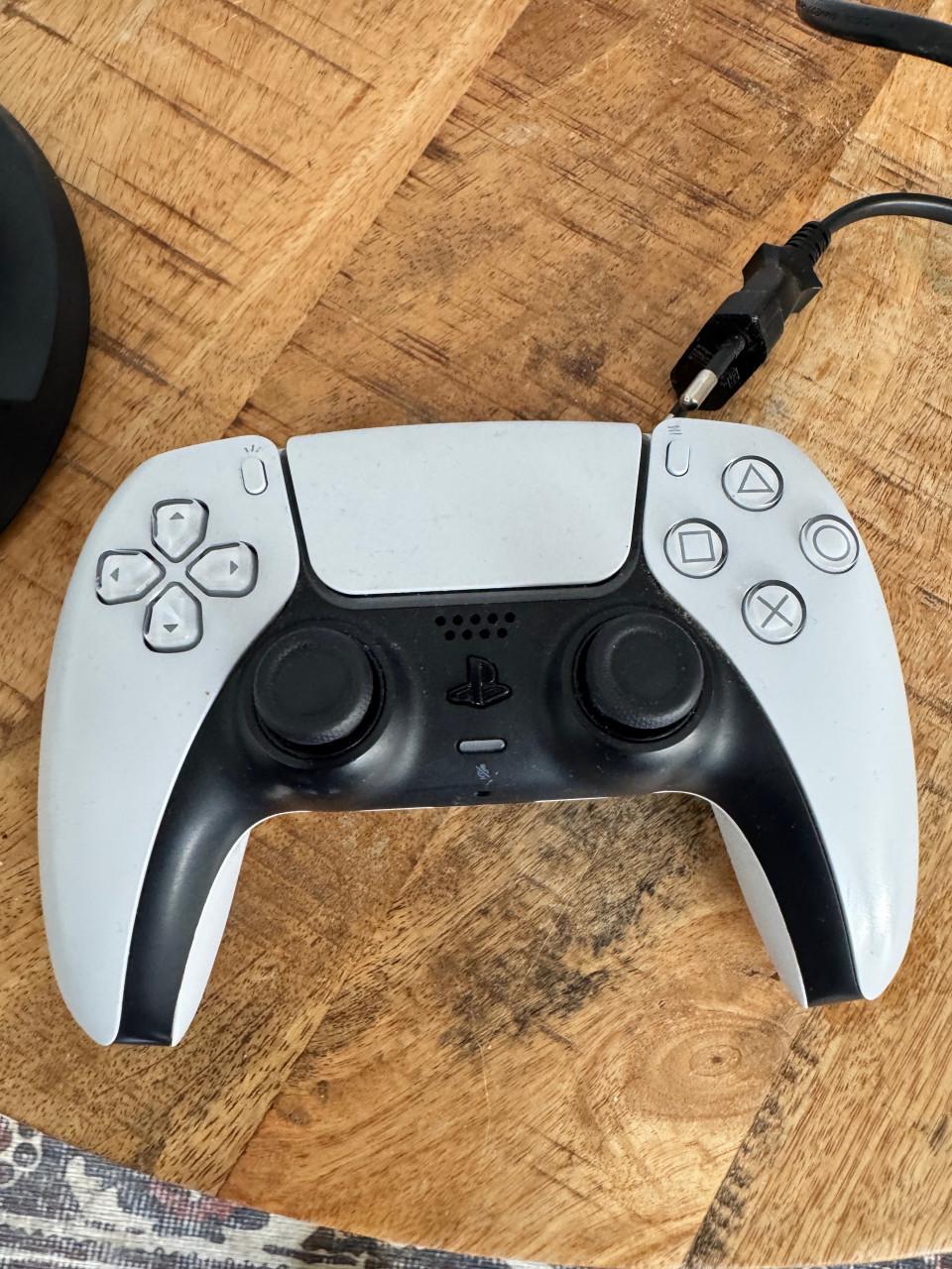 Playstation 5 disc edition met 1 controller en 4 spellen
